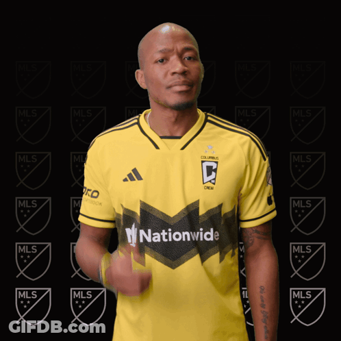 A Man Wearing A Yellow Jersey That Says Nationwide GIF
