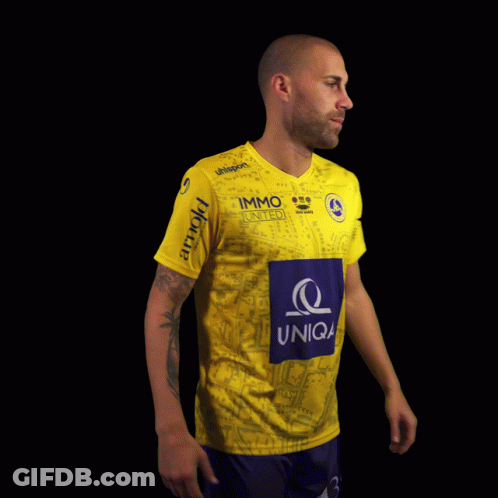 A Man Wearing A Yellow Jersey With The Number 9 Konrad On It GIF