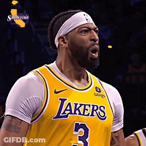 A Man Wearing A Yellow Lakers Jersey With The Number 3 GIF