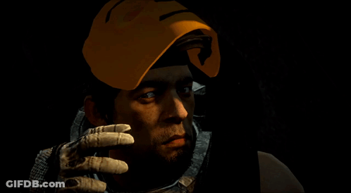 A Man Wearing A Yellow Mask With A Smile On It GIF