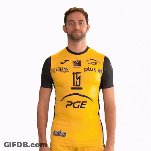 A Man Wearing A Yellow Pge Jersey Holds Up His Hand GIF