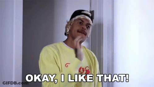 A Man Wearing A Yellow Shirt And A Headband Says Okay , I Like That ! GIF
