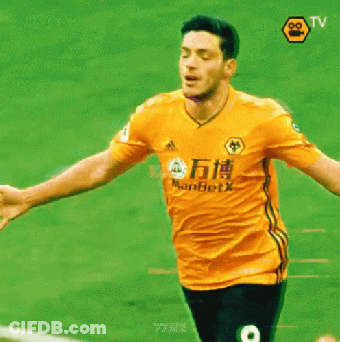 A Man Wearing A Yellow Shirt That Says Manbet X GIF