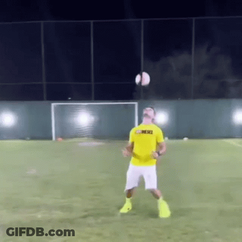 A Man Wearing A Yellow Shirt That Says Mesci GIF