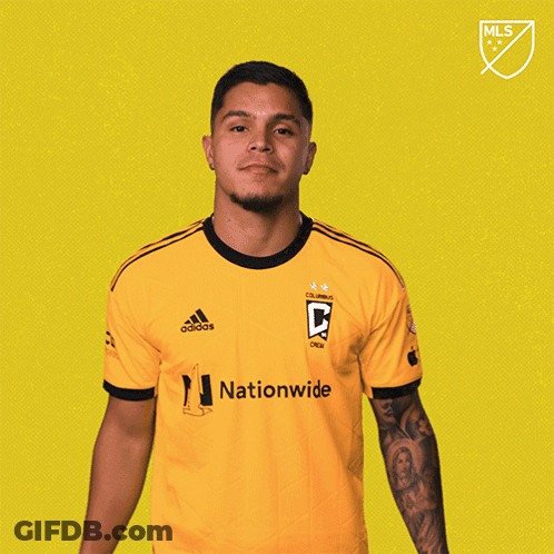 A Man Wearing A Yellow Shirt That Says " Nationwide " On It GIF