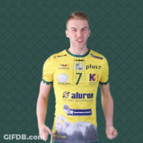 A Man Wearing A Yellow Shirt That Says Plus Saturn On It GIF