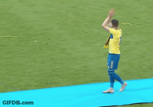 A Man Wearing A Yellow Shirt With The Number 11 On It Is Clapping GIF