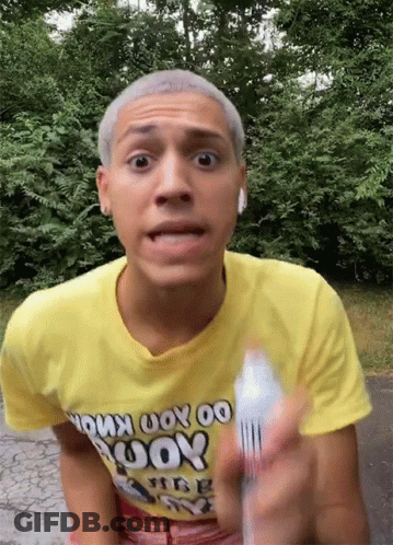 A Man Wearing A Yellow T-Shirt That Says " Do You Know " On It GIF