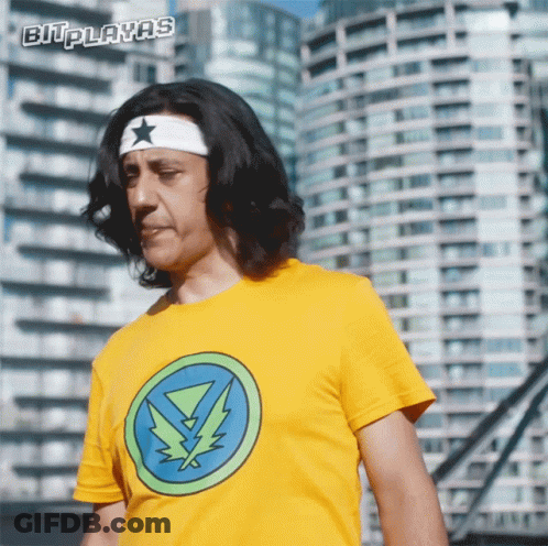A Man Wearing A Yellow T-Shirt With A Lightning Bolt On It GIF