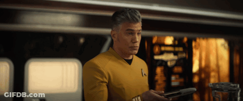 A Man Wearing A Yellow Uniform With The Letter K On His Chest GIF