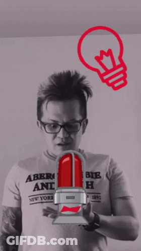 A Man Wearing An Abercrombie And Fitch Shirt Holds A Light Bulb GIF