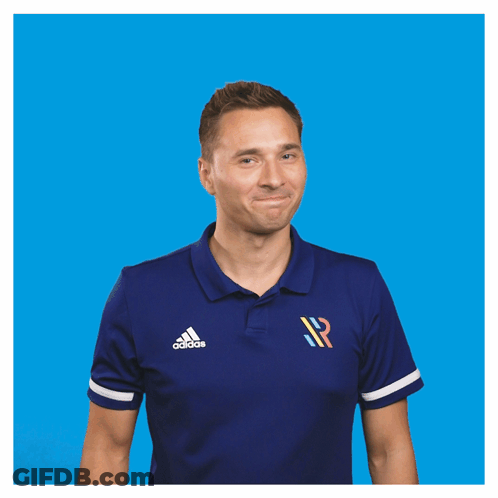 A Man Wearing An Adidas Shirt Holds A Red Card GIF