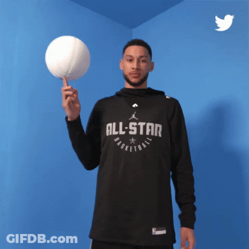 A Man Wearing An All Star Basketball Shirt Holds A Basketball GIF
