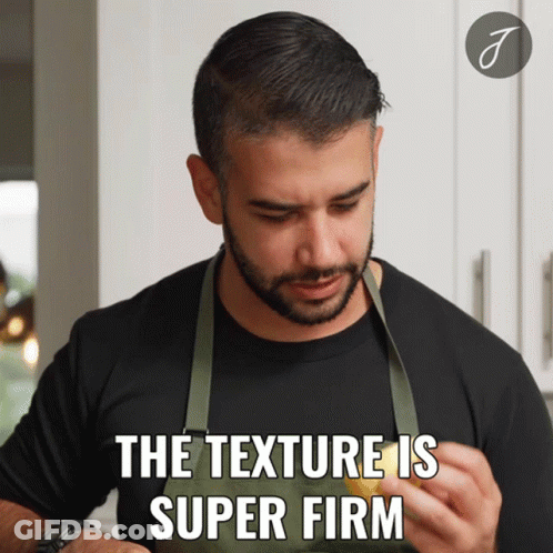 A Man Wearing An Apron Is Holding A Lemon And Says The Texture Is Super Firm GIF