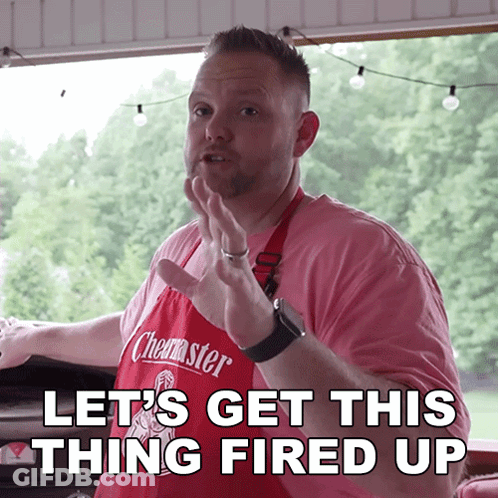 A Man Wearing An Apron That Says ' Chester ' On It GIF
