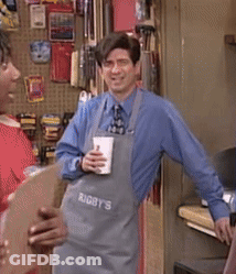 A Man Wearing An Apron That Says " Rigby 'S " On It GIF