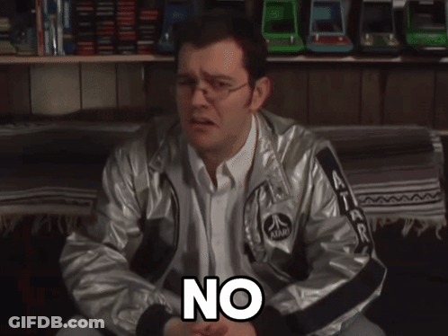 A Man Wearing An Atari Jacket Is Sitting On A Couch And Says It 'S Not True GIF