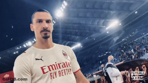 A Man Wearing An Emirates Fly Better Jersey GIF