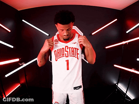 A Man Wearing An Ohio State Jersey With The Number 1 GIF