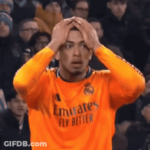 A Man Wearing An Orange Emirates Fly Better Jersey GIF