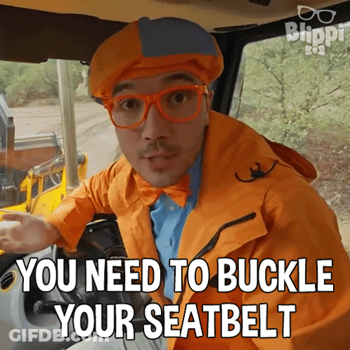 A Man Wearing An Orange Jacket And Glasses Says You Need To Buckle Your Seat Belt GIF