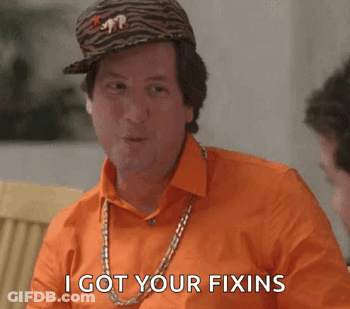 A Man Wearing An Orange Shirt And A Tiger Hat Says I Got Your Fixins GIF