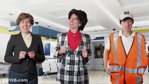 A Man Wearing An Orange Vest Has A Sticker On His Hat That Says ' Coca Cola ' On It GIF