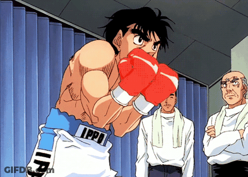 A Man Wearing Boxing Gloves With The Letters Ippi On His Belt GIF