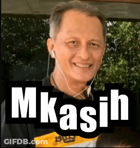 A Man Wearing Ear Buds And A Shirt That Says ' M Kasih ' On It GIF