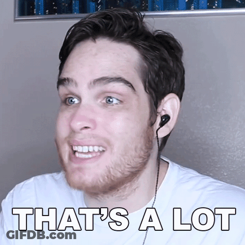 A Man Wearing Ear Buds Smiles With The Words That 'S A Lot Above Him GIF