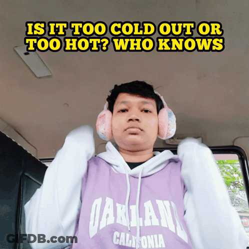 A Man Wearing Ear Muffs And A Hoodie That Says Oakland California On It GIF