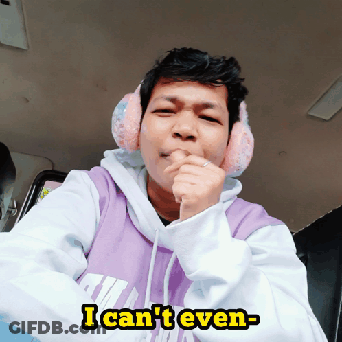 A Man Wearing Ear Muffs And A Purple Hoodie Says I Can T Even GIF