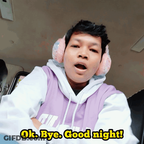 A Man Wearing Ear Muffs And A Purple Hoodie Says " Ok Bye Good Night " GIF