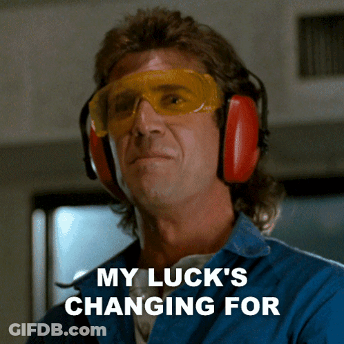A Man Wearing Ear Muffs And Goggles Has The Words My Luck 'S Changing For Above Him GIF