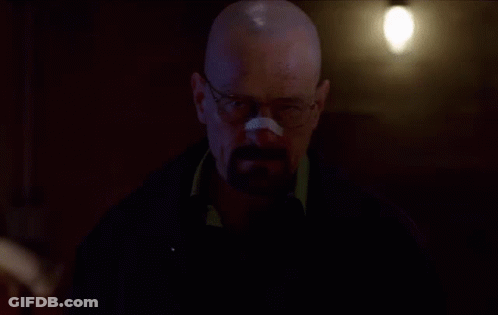 A Man Wearing Glasses And A Bandage On His Nose GIF