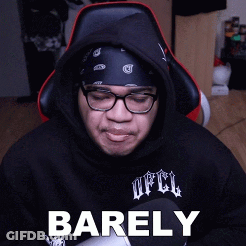 A Man Wearing Glasses And A Bandana Has Barely Written On His Face GIF
