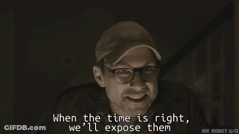 A Man Wearing Glasses And A Baseball Cap Says When The Time Is Right We 'Ll Expose Them GIF