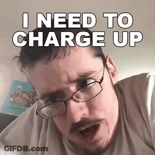 A Man Wearing Glasses And A Beard Says I Need To Charge Up GIF