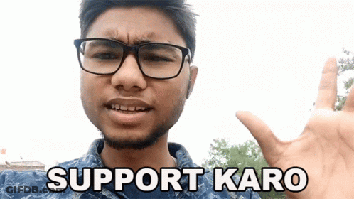 A Man Wearing Glasses And A Beard Says Support Karo GIF