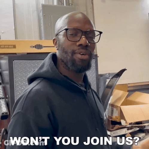 A Man Wearing Glasses And A Black Hoodie Says " Won T You Join Us " GIF