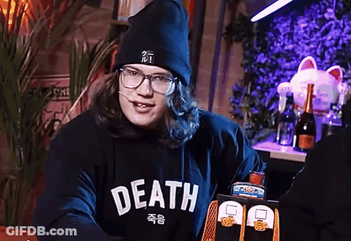 A Man Wearing Glasses And A Black Hoodie That Says Death GIF