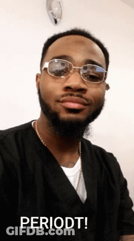 A Man Wearing Glasses And A Black Shirt Has The Word Periodt Written Below Him GIF