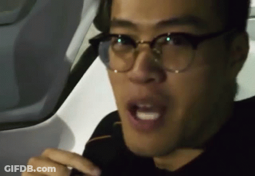 Man Wearing Glasses Making Funny Face GIF