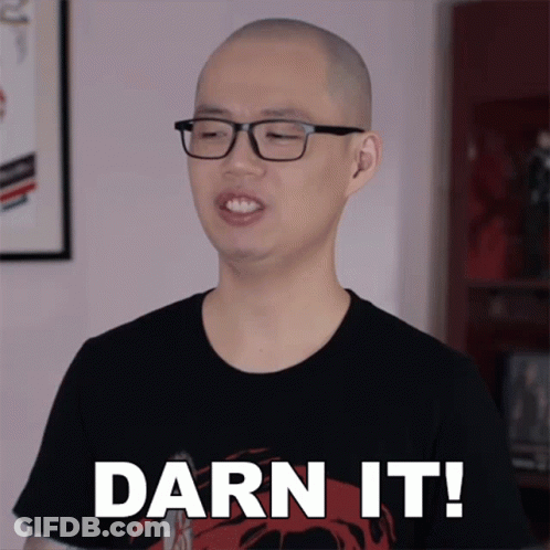 A Man Wearing Glasses And A Black Shirt Is Saying Darn It GIF