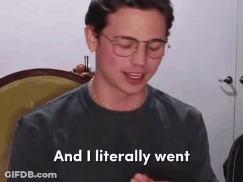 A Man Wearing Glasses And A Black Shirt Says And I Literally Went GIF