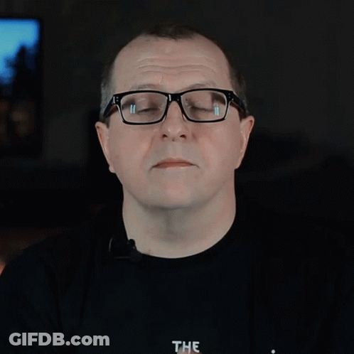 A Man Wearing Glasses And A Black Shirt Says Motion Sickness The GIF