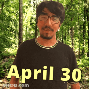 A Man Wearing Glasses And A Black Shirt That Says April 30 On It GIF