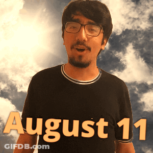 A Man Wearing Glasses And A Black Shirt That Says August 11 On It GIF
