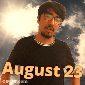 A Man Wearing Glasses And A Black Shirt That Says August 23 On It GIF