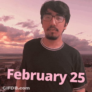 A Man Wearing Glasses And A Black Shirt That Says February 25 On It GIF